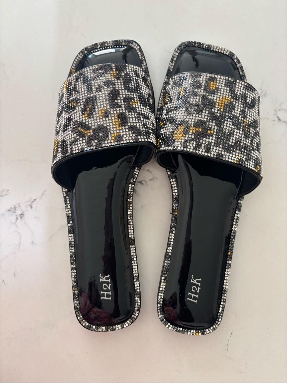 New Metallic Leopard Slide Sandals in Black and Gold